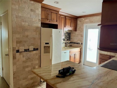 The property flooded twice last year and is being sold as its on Pasadena Yacht and Country Club in Florida - for sale on GolfHomes.com, golf home, golf lot