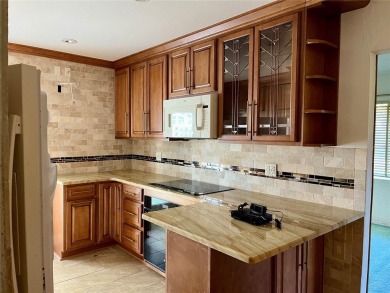 The property flooded twice last year and is being sold as its on Pasadena Yacht and Country Club in Florida - for sale on GolfHomes.com, golf home, golf lot