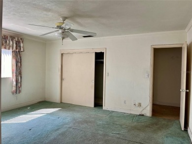 The property flooded twice last year and is being sold as its on Pasadena Yacht and Country Club in Florida - for sale on GolfHomes.com, golf home, golf lot