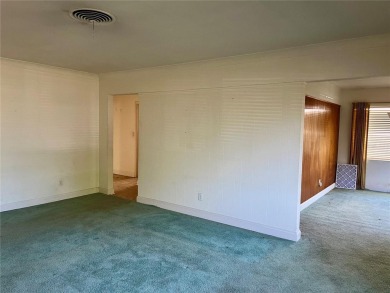The property flooded twice last year and is being sold as its on Pasadena Yacht and Country Club in Florida - for sale on GolfHomes.com, golf home, golf lot