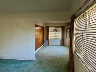 The property flooded twice last year and is being sold as its on Pasadena Yacht and Country Club in Florida - for sale on GolfHomes.com, golf home, golf lot