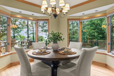 This beautifully maintained golf course home offers sweeping on Reynolds Lake Oconee - The Landing in Georgia - for sale on GolfHomes.com, golf home, golf lot