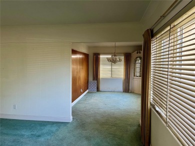 The property flooded twice last year and is being sold as its on Pasadena Yacht and Country Club in Florida - for sale on GolfHomes.com, golf home, golf lot