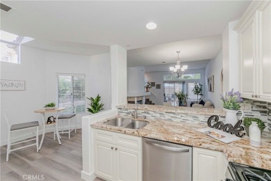 Nestled in the highly sought-after community of Maison De Fleur on Los Coyotes Country Club in California - for sale on GolfHomes.com, golf home, golf lot