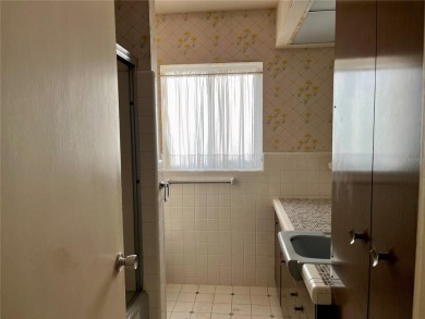 The property flooded twice last year and is being sold as its on Pasadena Yacht and Country Club in Florida - for sale on GolfHomes.com, golf home, golf lot