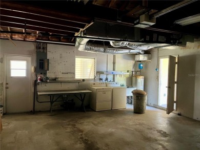 The property flooded twice last year and is being sold as its on Pasadena Yacht and Country Club in Florida - for sale on GolfHomes.com, golf home, golf lot