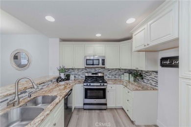 Nestled in the highly sought-after community of Maison De Fleur on Los Coyotes Country Club in California - for sale on GolfHomes.com, golf home, golf lot