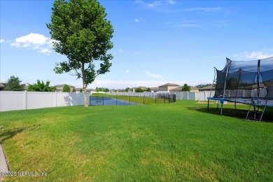 Now available in Magnolia West! 4 bedrooms w/ huge backyard on a on Magnolia Point Golf and Country Club in Florida - for sale on GolfHomes.com, golf home, golf lot