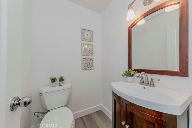 Nestled in the highly sought-after community of Maison De Fleur on Los Coyotes Country Club in California - for sale on GolfHomes.com, golf home, golf lot