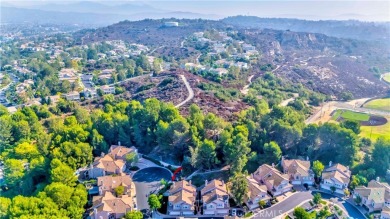 Nestled in the highly sought-after community of Maison De Fleur on Los Coyotes Country Club in California - for sale on GolfHomes.com, golf home, golf lot