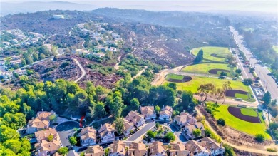 Nestled in the highly sought-after community of Maison De Fleur on Los Coyotes Country Club in California - for sale on GolfHomes.com, golf home, golf lot