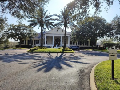 This remarkable residence seamlessly blends modern elegance and on Southern Hills Plantation Club in Florida - for sale on GolfHomes.com, golf home, golf lot
