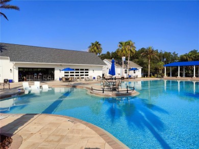 This remarkable residence seamlessly blends modern elegance and on Southern Hills Plantation Club in Florida - for sale on GolfHomes.com, golf home, golf lot