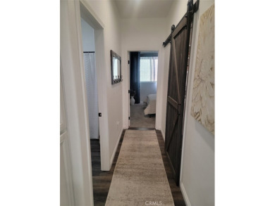 This beautiful KHovnanian built home has been recently updated on Hemet Golf Club in California - for sale on GolfHomes.com, golf home, golf lot