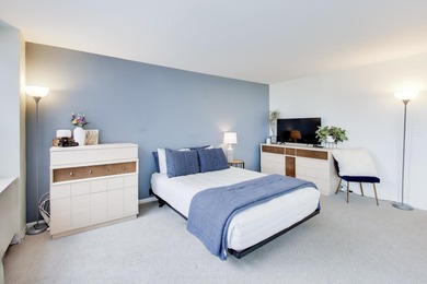 Discover this stunning east-facing balcony residence at Imperial on Sydney R. Marovitz Golf Course in Illinois - for sale on GolfHomes.com, golf home, golf lot