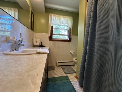 Welcome to 350 Lake Hill Drive! This 4-bed, 2-bath split-foyer on Worthington Country Club in Minnesota - for sale on GolfHomes.com, golf home, golf lot