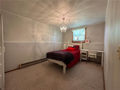 Welcome to 350 Lake Hill Drive! This 4-bed, 2-bath split-foyer on Worthington Country Club in Minnesota - for sale on GolfHomes.com, golf home, golf lot
