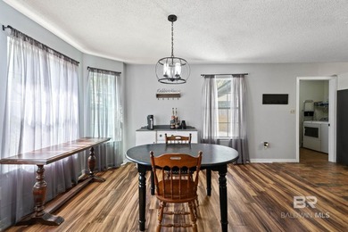 Welcome home to this beautifully updated one-story ranch in the on Lake Forest Yacht and Country Club in Alabama - for sale on GolfHomes.com, golf home, golf lot