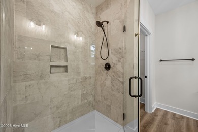 Welcome to the new (Jan 2026) Treweek Construction home in the on Harbour Point Golf Club in North Carolina - for sale on GolfHomes.com, golf home, golf lot