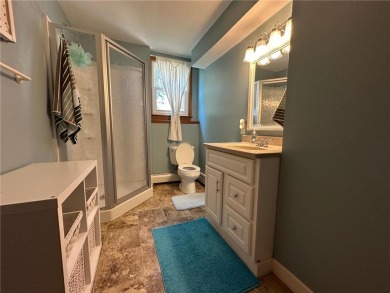 Welcome to 350 Lake Hill Drive! This 4-bed, 2-bath split-foyer on Worthington Country Club in Minnesota - for sale on GolfHomes.com, golf home, golf lot