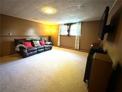 Welcome to 350 Lake Hill Drive! This 4-bed, 2-bath split-foyer on Worthington Country Club in Minnesota - for sale on GolfHomes.com, golf home, golf lot