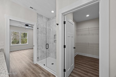 Welcome to the new (Jan 2026) Treweek Construction home in the on Harbour Point Golf Club in North Carolina - for sale on GolfHomes.com, golf home, golf lot