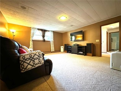 Welcome to 350 Lake Hill Drive! This 4-bed, 2-bath split-foyer on Worthington Country Club in Minnesota - for sale on GolfHomes.com, golf home, golf lot