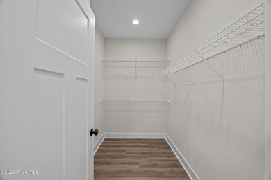 Welcome to the new (Jan 2026) Treweek Construction home in the on Harbour Point Golf Club in North Carolina - for sale on GolfHomes.com, golf home, golf lot