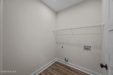 Welcome to the new (Jan 2026) Treweek Construction home in the on Harbour Point Golf Club in North Carolina - for sale on GolfHomes.com, golf home, golf lot