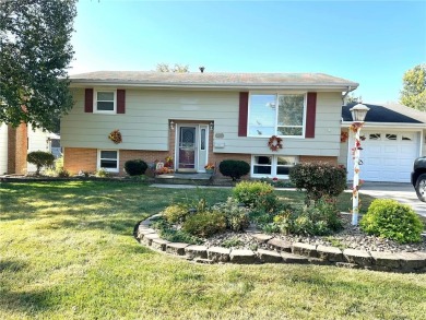 Welcome to 350 Lake Hill Drive! This 4-bed, 2-bath split-foyer on Worthington Country Club in Minnesota - for sale on GolfHomes.com, golf home, golf lot