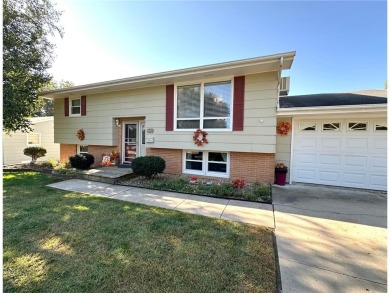 Welcome to 350 Lake Hill Drive! This 4-bed, 2-bath split-foyer on Worthington Country Club in Minnesota - for sale on GolfHomes.com, golf home, golf lot