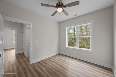 Welcome to the new (Jan 2026) Treweek Construction home in the on Harbour Point Golf Club in North Carolina - for sale on GolfHomes.com, golf home, golf lot