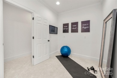 Located in the heart of Ballantyne Country Club, this move-in on Ballantyne Resort and Country Club in North Carolina - for sale on GolfHomes.com, golf home, golf lot