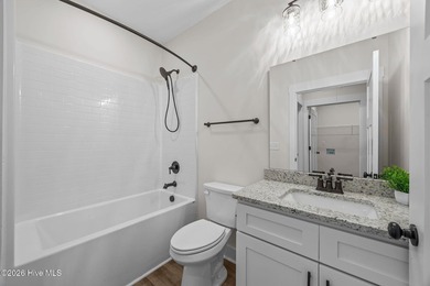 Welcome to the new (Jan 2026) Treweek Construction home in the on Harbour Point Golf Club in North Carolina - for sale on GolfHomes.com, golf home, golf lot