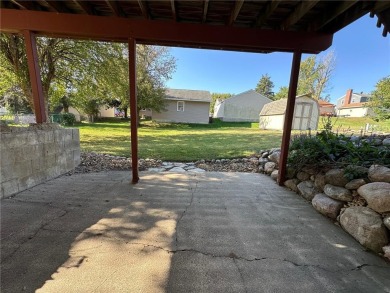 Welcome to 350 Lake Hill Drive! This 4-bed, 2-bath split-foyer on Worthington Country Club in Minnesota - for sale on GolfHomes.com, golf home, golf lot