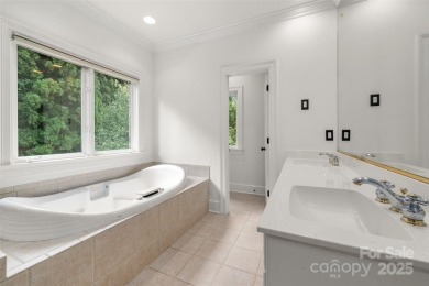 Located in the heart of Ballantyne Country Club, this move-in on Ballantyne Resort and Country Club in North Carolina - for sale on GolfHomes.com, golf home, golf lot