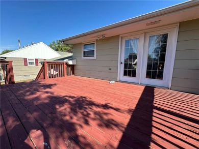 Welcome to 350 Lake Hill Drive! This 4-bed, 2-bath split-foyer on Worthington Country Club in Minnesota - for sale on GolfHomes.com, golf home, golf lot