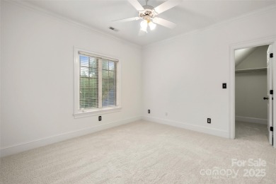 Located in the heart of Ballantyne Country Club, this move-in on Ballantyne Resort and Country Club in North Carolina - for sale on GolfHomes.com, golf home, golf lot