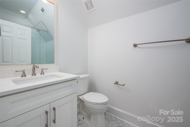 Located in the heart of Ballantyne Country Club, this move-in on Ballantyne Resort and Country Club in North Carolina - for sale on GolfHomes.com, golf home, golf lot