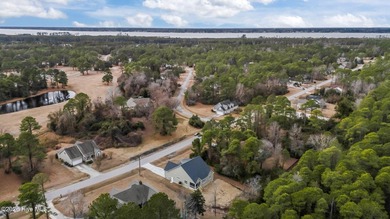 Welcome to the new (Jan 2026) Treweek Construction home in the on Harbour Point Golf Club in North Carolina - for sale on GolfHomes.com, golf home, golf lot