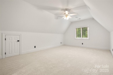 Located in the heart of Ballantyne Country Club, this move-in on Ballantyne Resort and Country Club in North Carolina - for sale on GolfHomes.com, golf home, golf lot