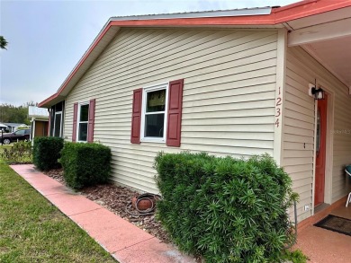 NO BOND! Furnished 2/2 turnkey open floor plan WOOD FRAME HOME! on Lakes of Lady Lake Golf Course in Florida - for sale on GolfHomes.com, golf home, golf lot