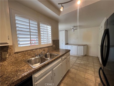 End unit, 3-bedroom, 2-bathroom Villa Puerta, boasting mountain on Leisure Village Par 3 Golf Course in California - for sale on GolfHomes.com, golf home, golf lot