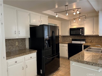 End unit, 3-bedroom, 2-bathroom Villa Puerta, boasting mountain on Leisure Village Par 3 Golf Course in California - for sale on GolfHomes.com, golf home, golf lot