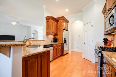 Welcome to 128 Harbourtown Drive - Woodbridge Subdivision. This on Woodbridge Golf Links in North Carolina - for sale on GolfHomes.com, golf home, golf lot