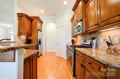 Welcome to 128 Harbourtown Drive - Woodbridge Subdivision. This on Woodbridge Golf Links in North Carolina - for sale on GolfHomes.com, golf home, golf lot