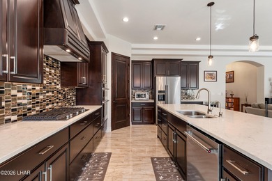 Beautiful RV Garage Home Near the Golf Course! This like-new on London Bridge Golf Course in Arizona - for sale on GolfHomes.com, golf home, golf lot