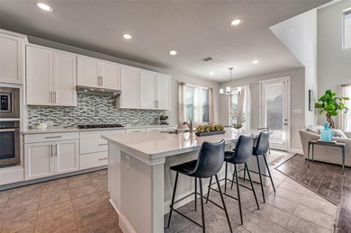 STUNNING Meritage built corner lot home located in the highly on The Tribute At the Colony in Texas - for sale on GolfHomes.com, golf home, golf lot