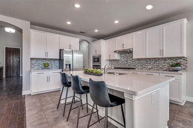 STUNNING Meritage built corner lot home located in the highly on The Tribute At the Colony in Texas - for sale on GolfHomes.com, golf home, golf lot