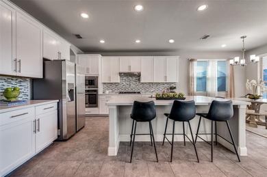 STUNNING Meritage built corner lot home located in the highly on The Tribute At the Colony in Texas - for sale on GolfHomes.com, golf home, golf lot